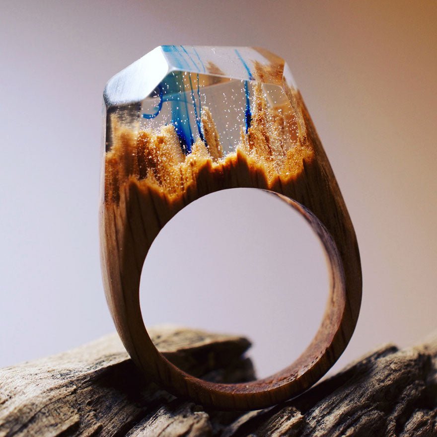 Tiny Worlds Hidden in Wooden Rings By Secret Wood